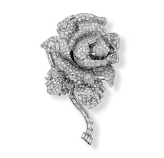 Diamond encrusted brooch in the shape of a rose and stem