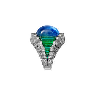 Ring with large blue and green central stone and diamonds on the edge