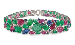 Mulit-coloured bandeau with stones carved into foliage and flowers 