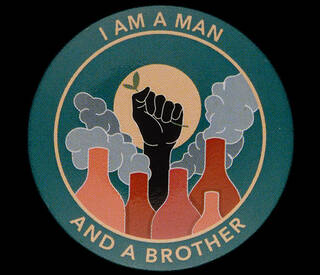 Blue circle with image of smiking chimneys and a raised fist in black